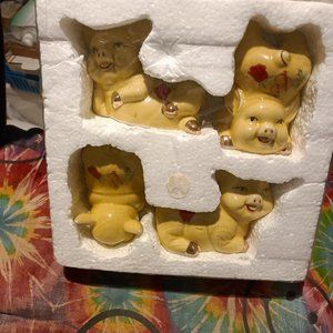 4 PORCELAIN PIGS